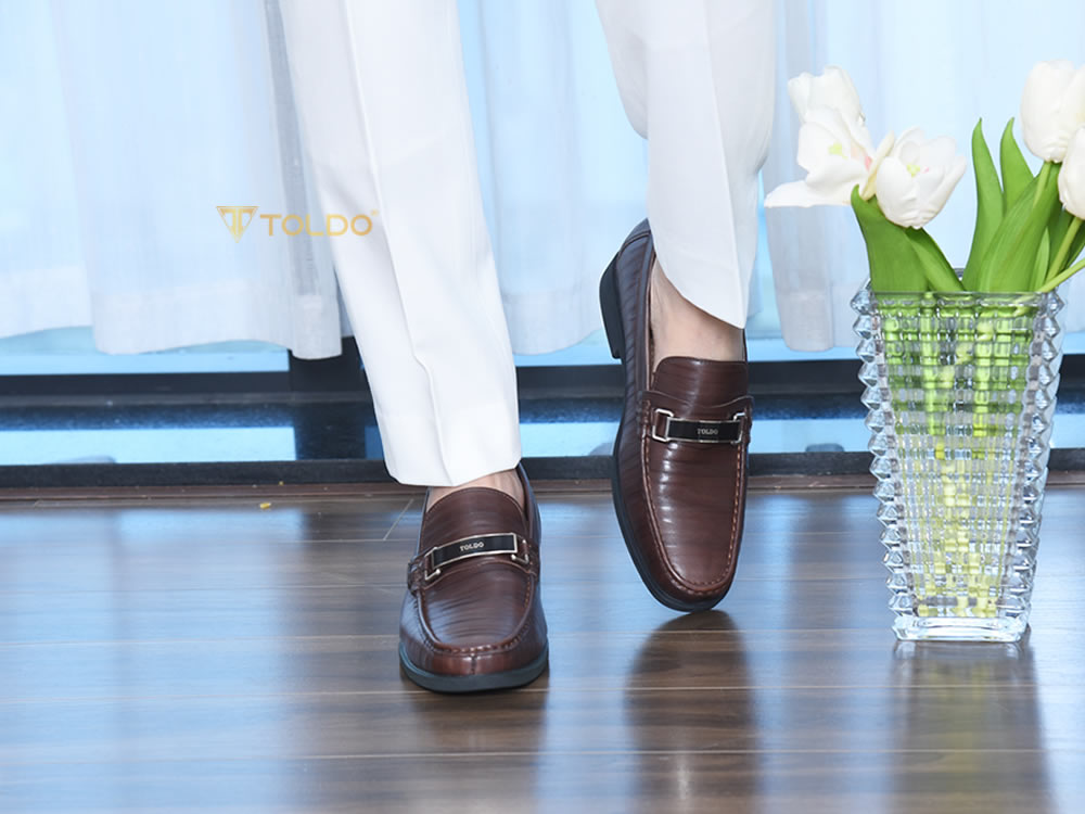 Giày tăng 7cm vân da thật đế khâu